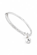 Sterling silver bangle with oxidised A engraving