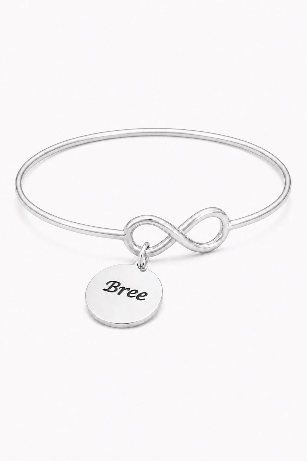 Smooth sterling silver infinity bangle with Bree oxidised engraving