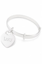 Smooth sterling silver bangle with Lucy natural engraving