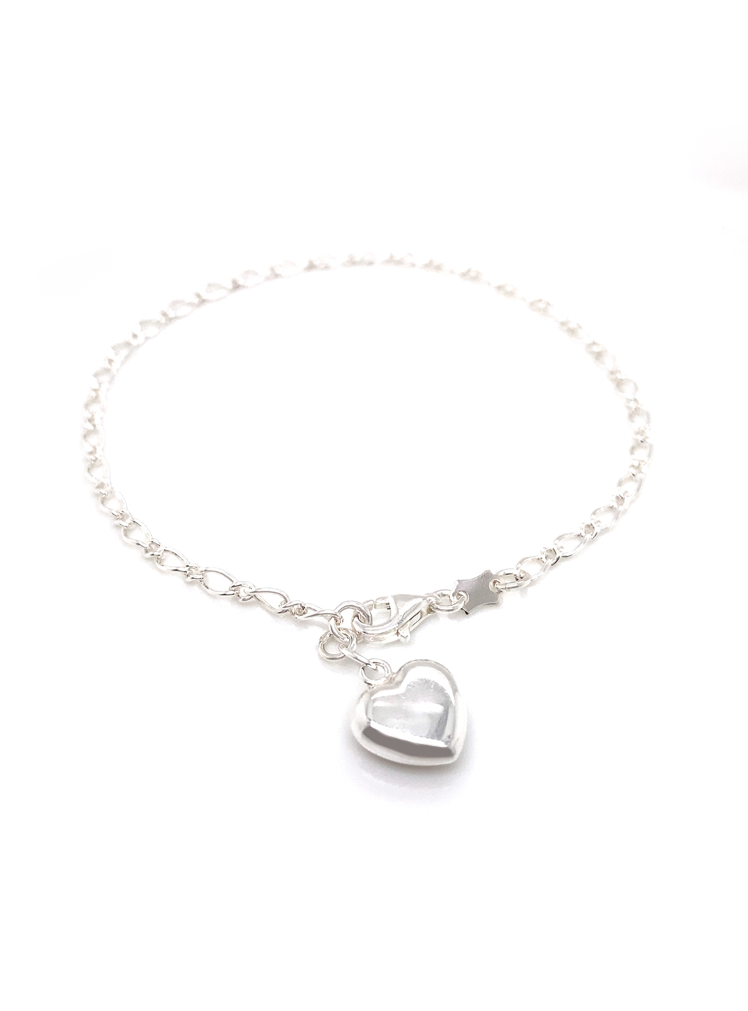 Puffed Heart Charm Figaro Curb Bracelet in Sterling Silver