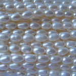 No.10 FRESHWATER PEARLS NATURAL WHITE RICE PEARLS 9x6mm LOOSE STRAND