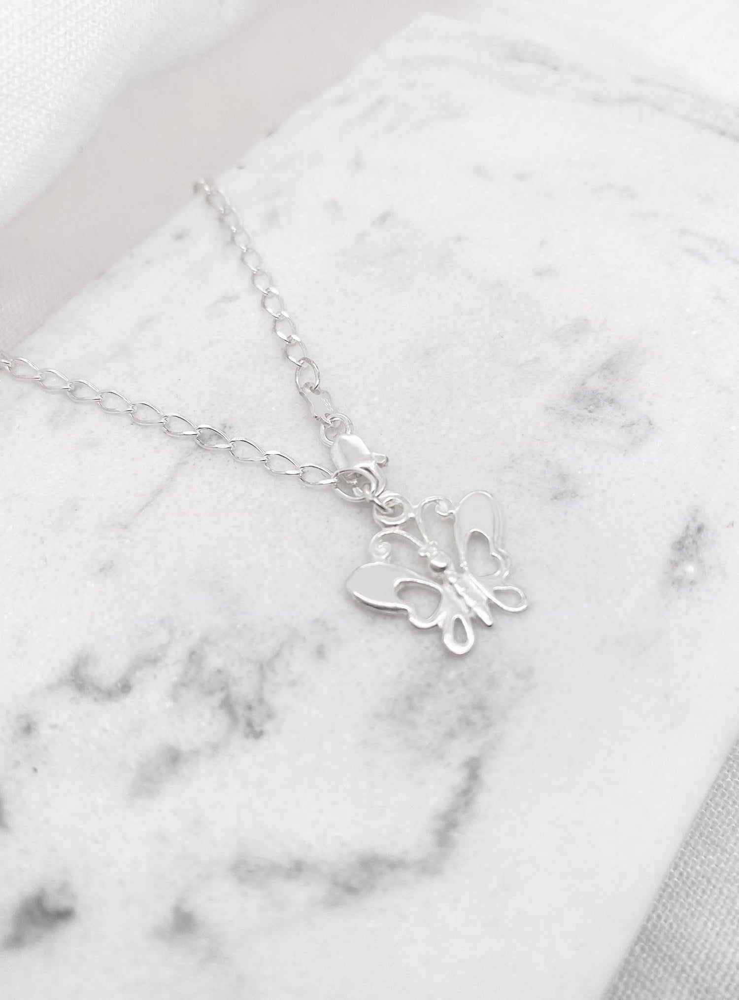 Butterfly Charm Curb Bracelet in Sterling Silver