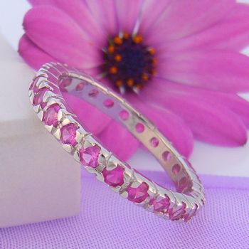 PASTICHE STERLING SILVER FUCHIA CZ ETERNITY RING -R582FCZ