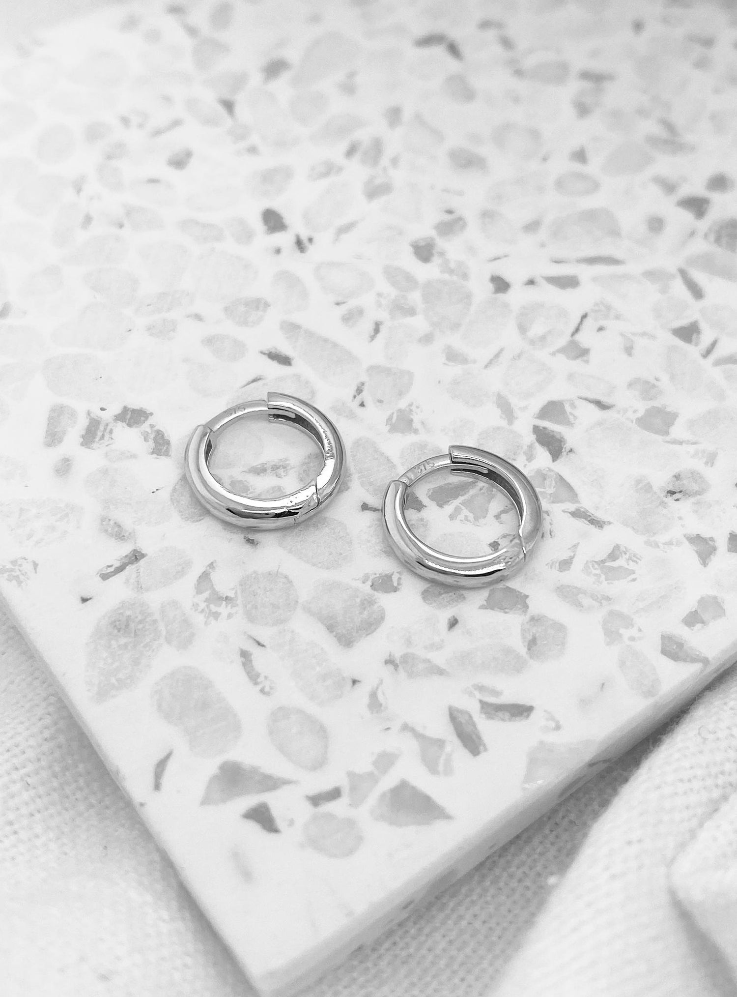 Aurelia Teeny Tiny Huggie Hoop Earrings in 9ct White Gold
