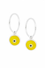 Baby yellow evil eye sterling silver charm sleeper earrings on a white background