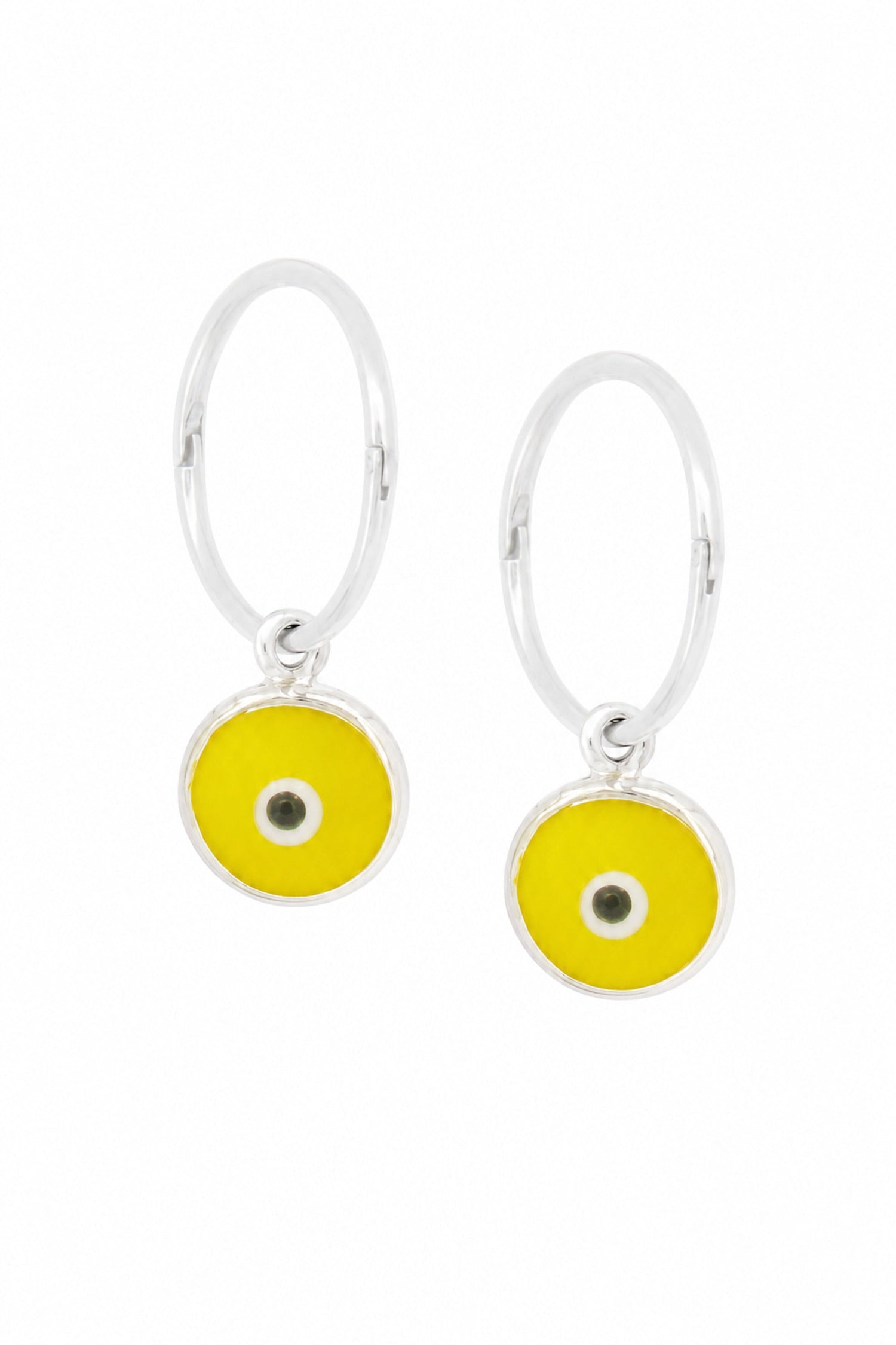 Baby yellow evil eye sterling silver charm sleeper earrings on a white background