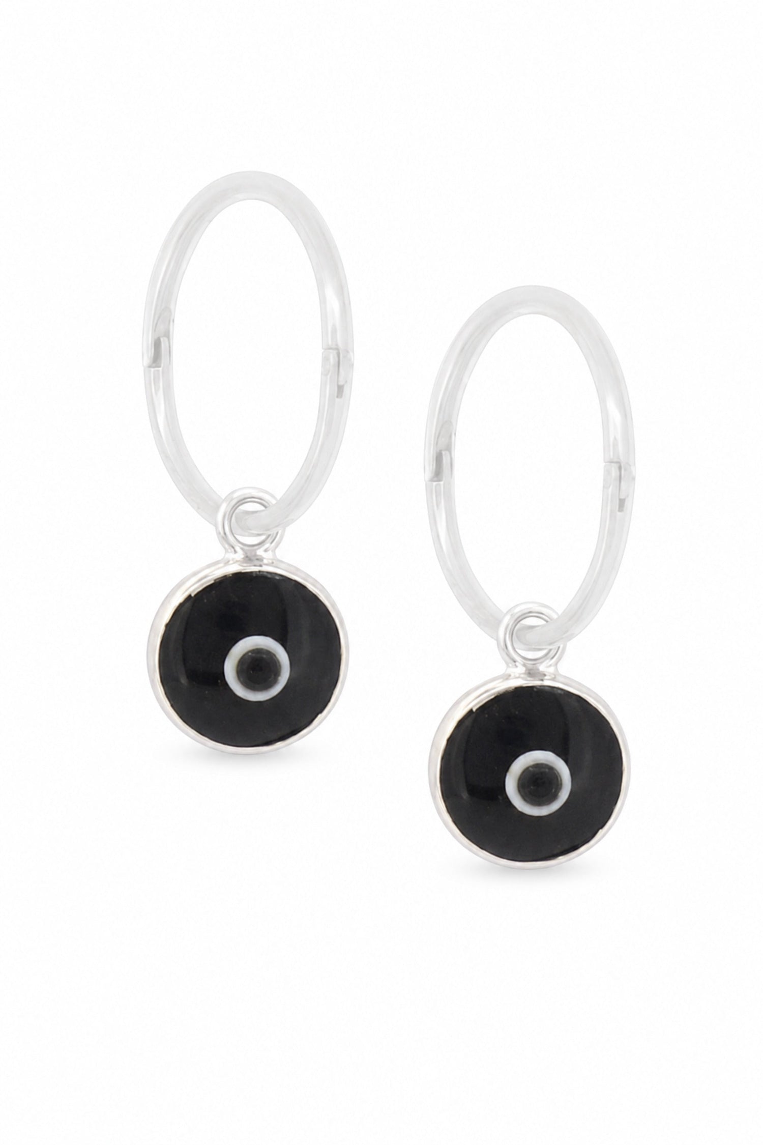 Black evil eye sterling silver charm sleeper earrings on a white background