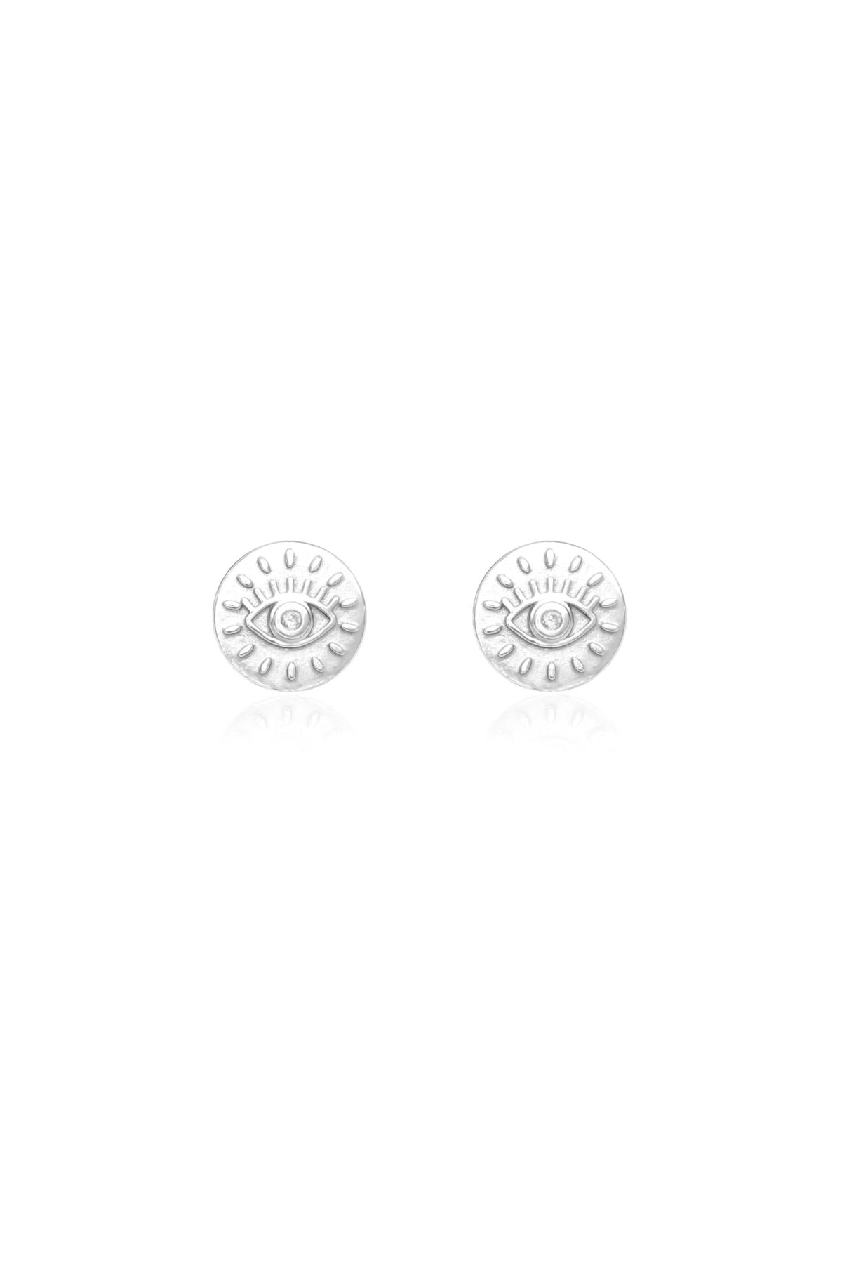 Circle disc evil eye stud earrings in sterling silver on a white background