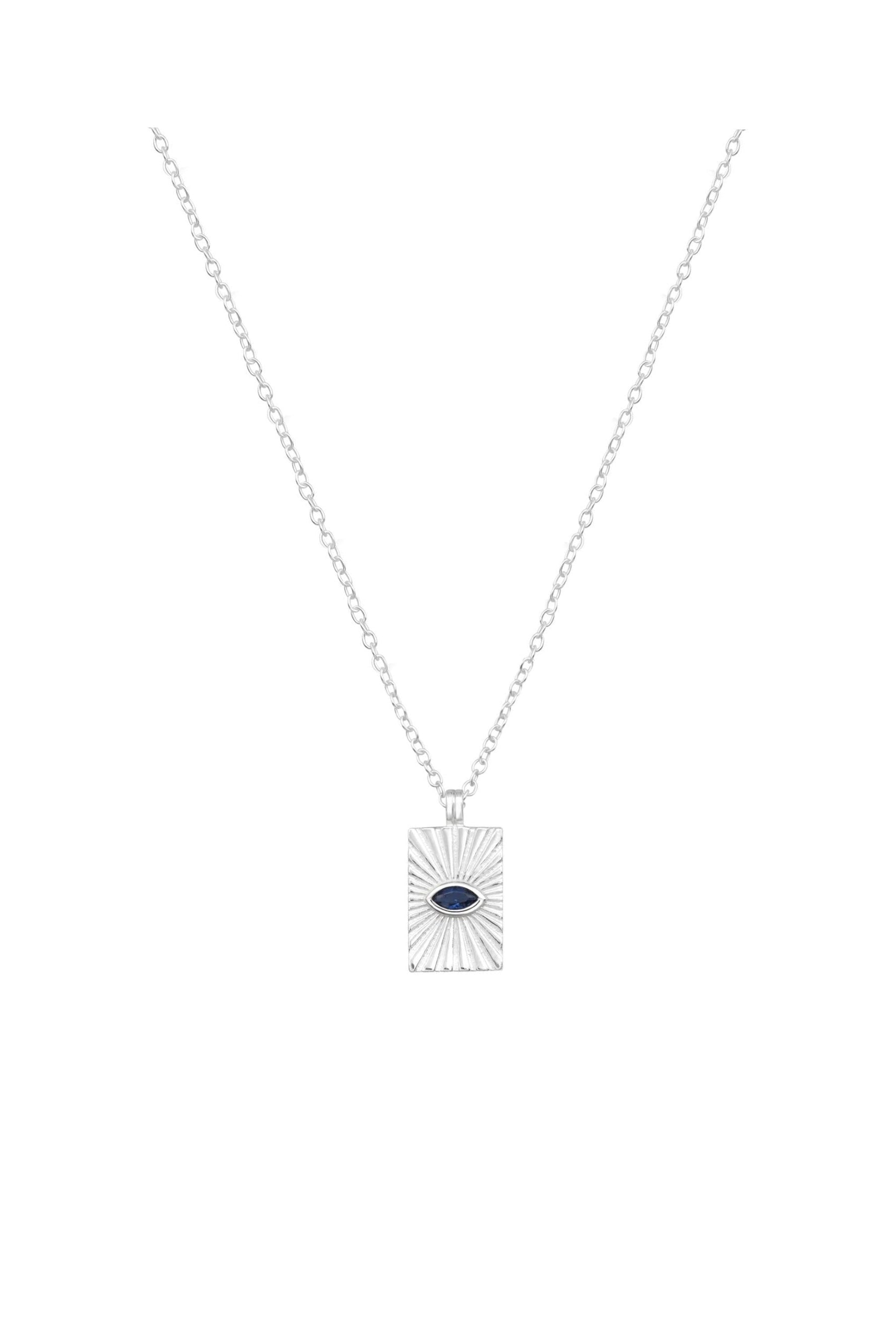 Lucky protection evil eye tarot card charm necklace on a white background
