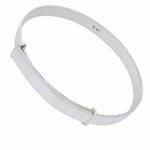 Expandable sterling silver bangle in a flat 5mm design on a white background