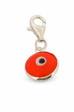 Orange evil eye sterling silver clip-on charm on a white background