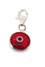 Red evil eye sterling silver clip-on charm on a white background