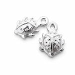 Pair of sterling silver 8mm ladybird sleeper charms on a white background