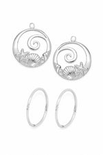 Sterling silver wave starfish and shell charms with sleeper earrings on a white background