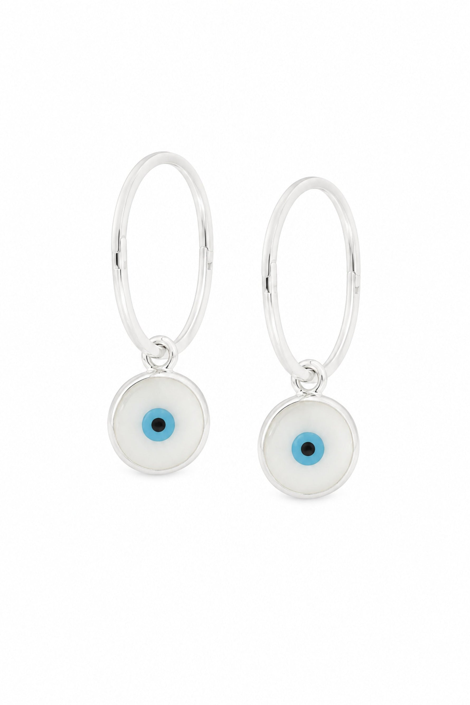White evil eye sterling silver charm sleeper earrings on a white background